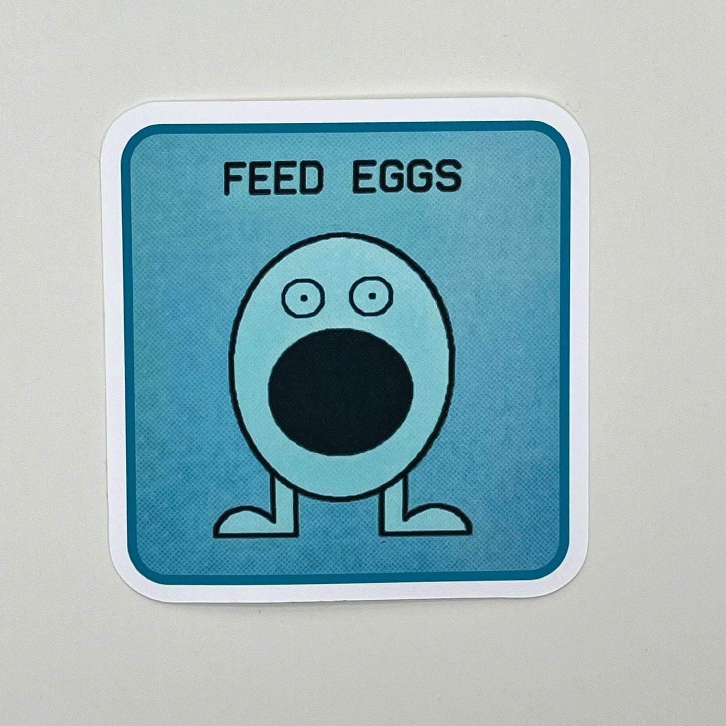 Feed Eggs Sticker